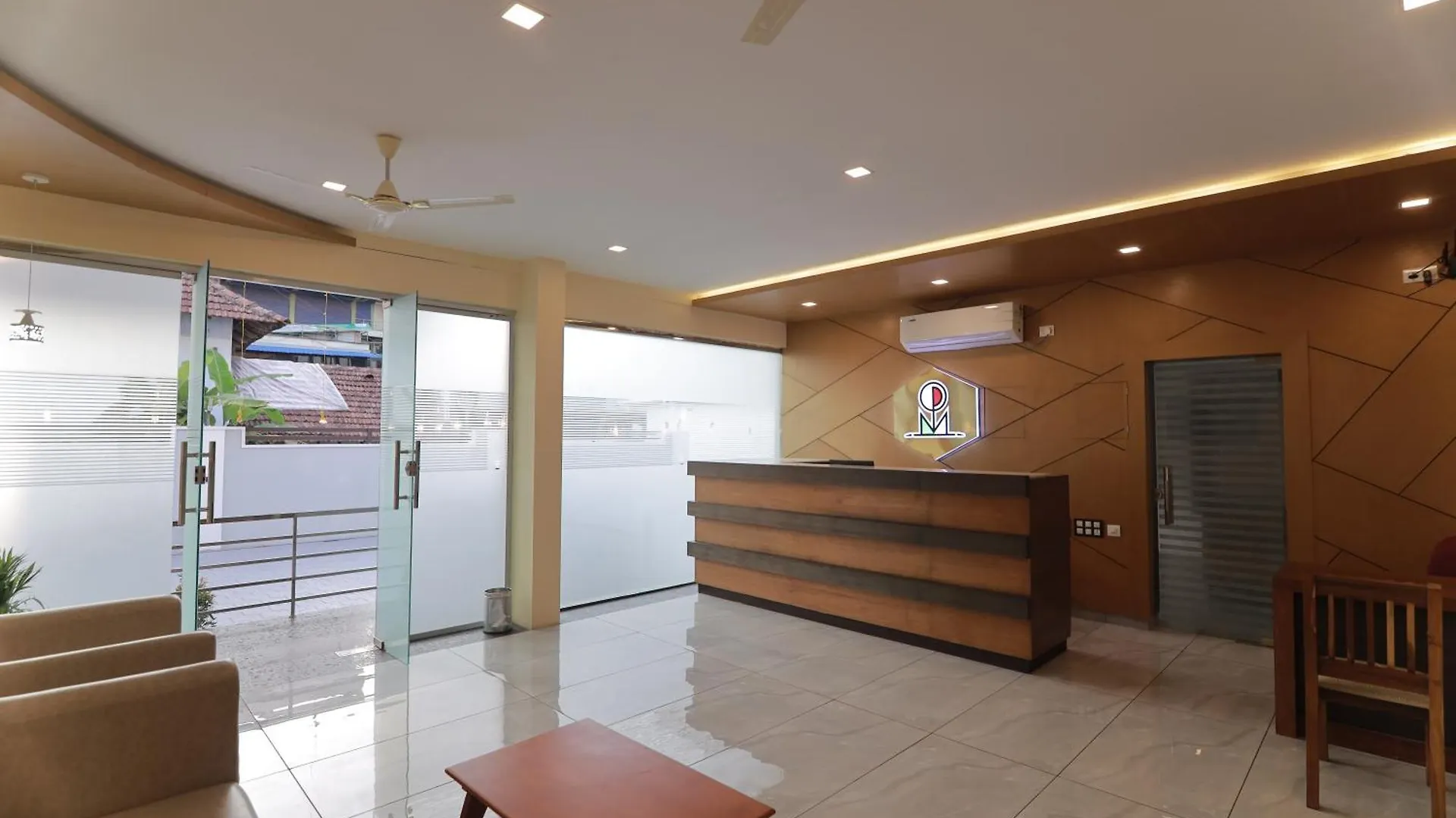 Hotel Opm Inn Payyannur